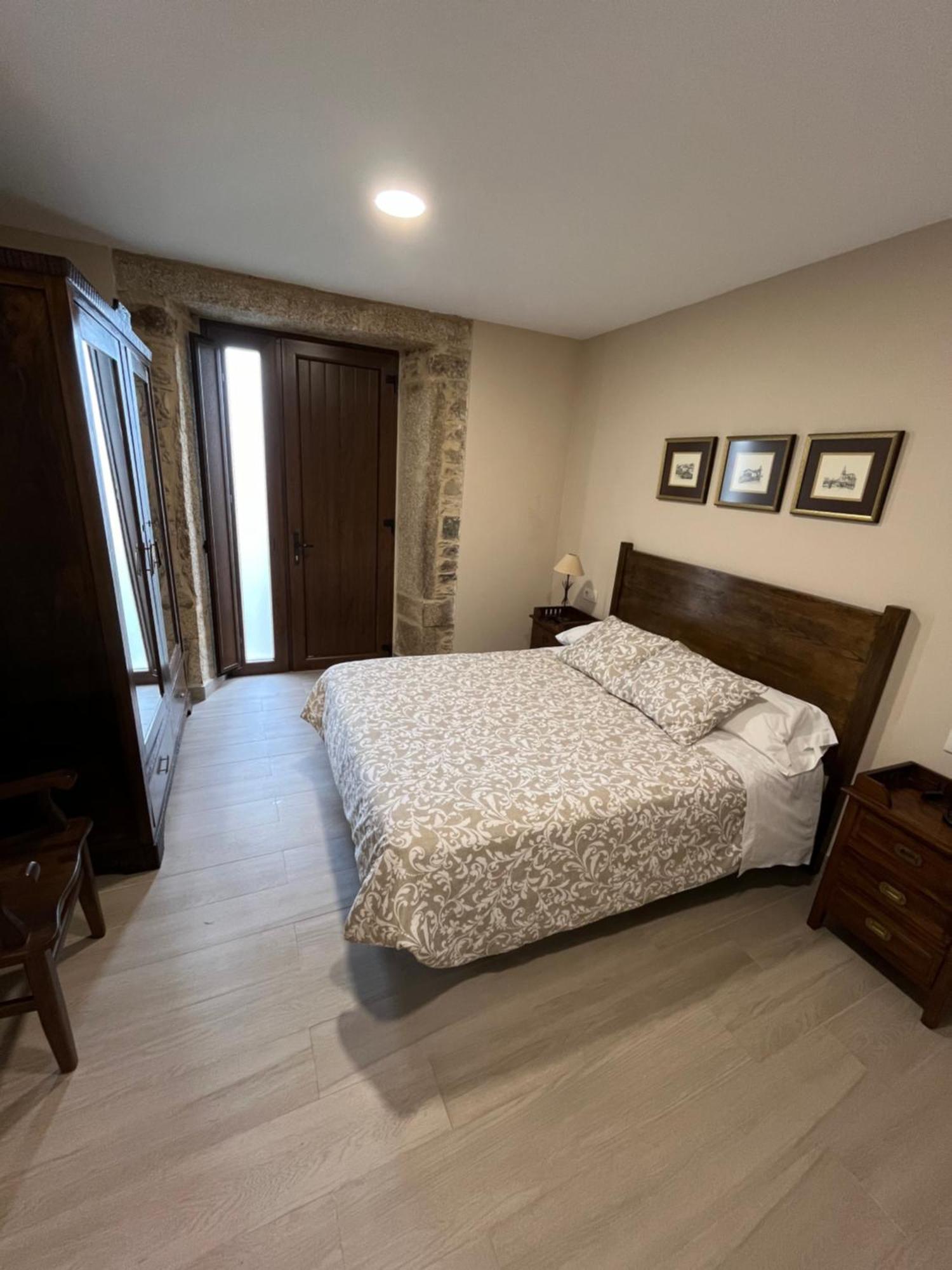 Affittacamere Casa Victoriano Melide Esterno foto